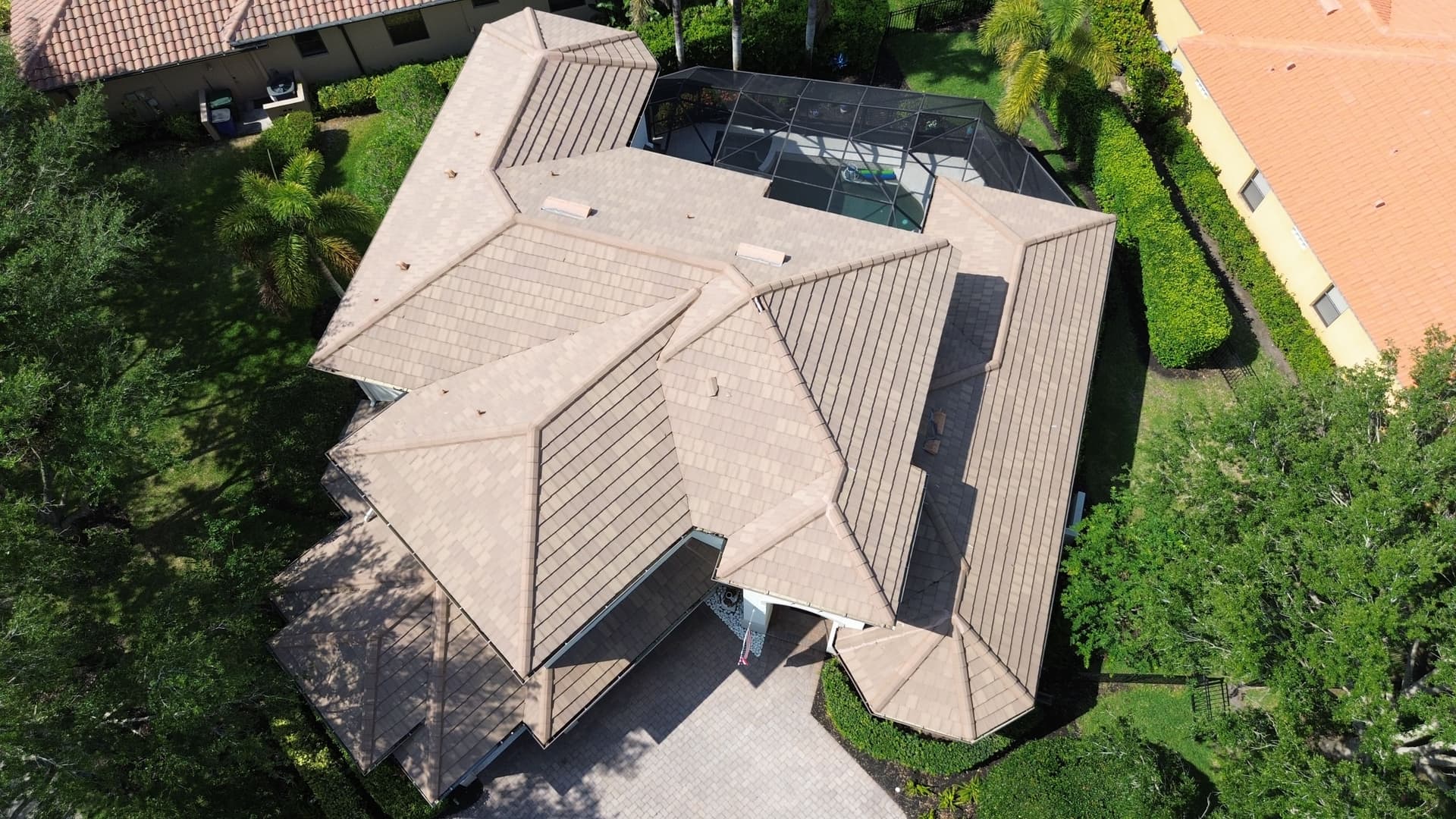 Cracked Clay Tiles Out, Metal Tile Roof In for This Florida Home image