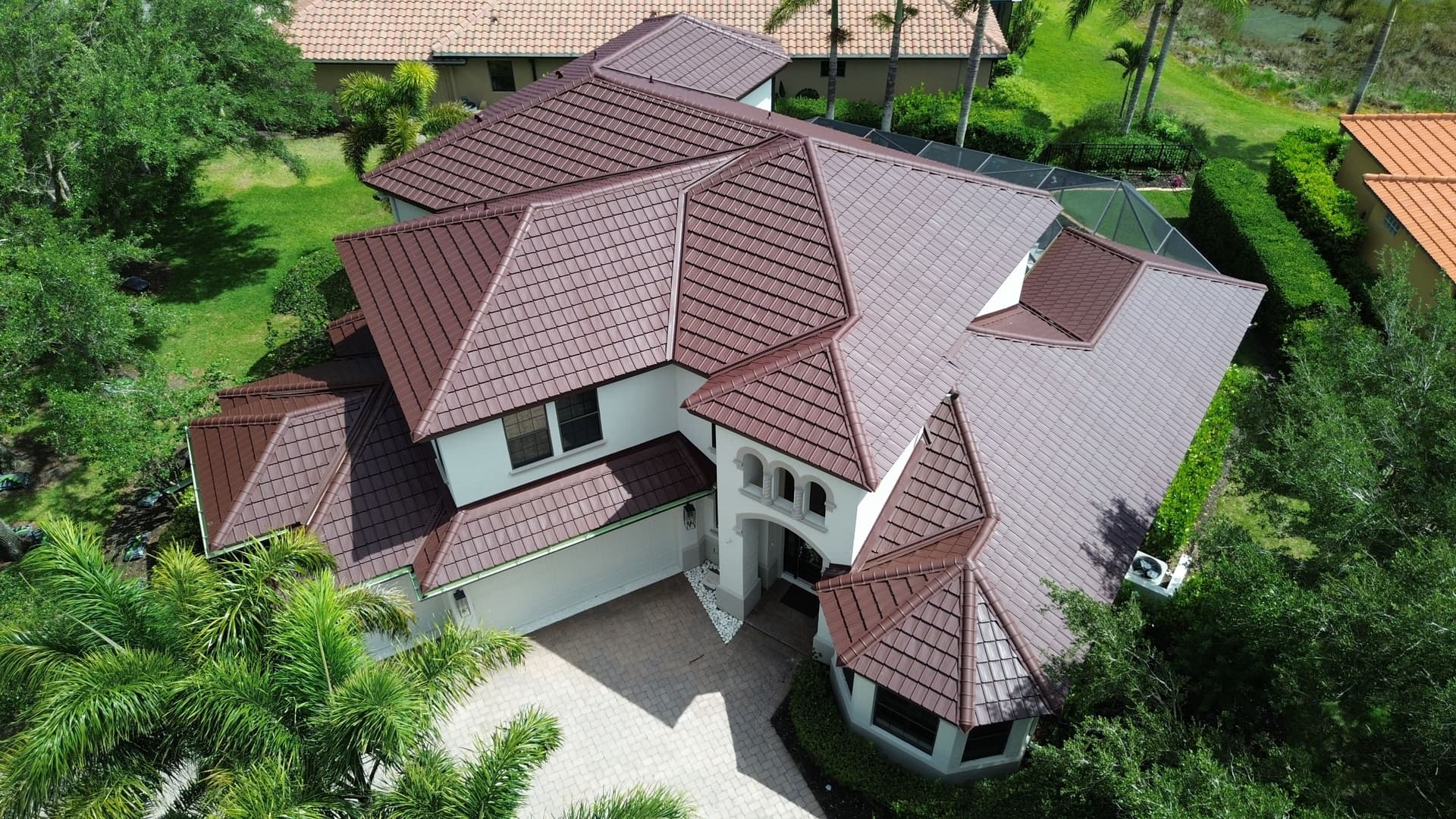 Gallery photos for Cracked Clay Tiles Out, Metal Tile Roof In for This Florida Home: Image #3