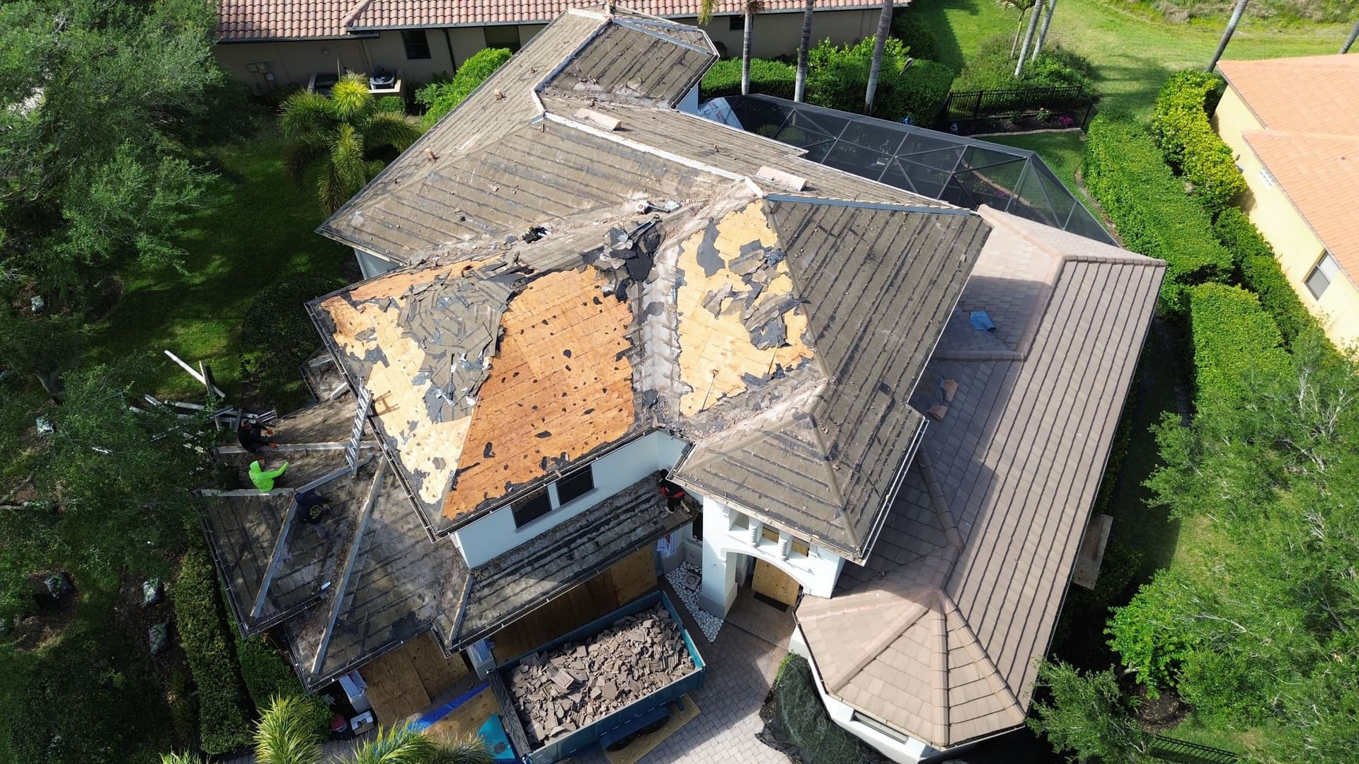 Gallery photos for Cracked Clay Tiles Out, Metal Tile Roof In for This Florida Home: Image #1